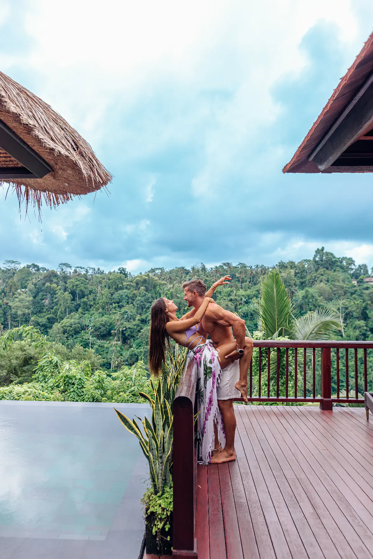 Couple enjoying private pool villa at Hanging Gardens of Bali in March”
