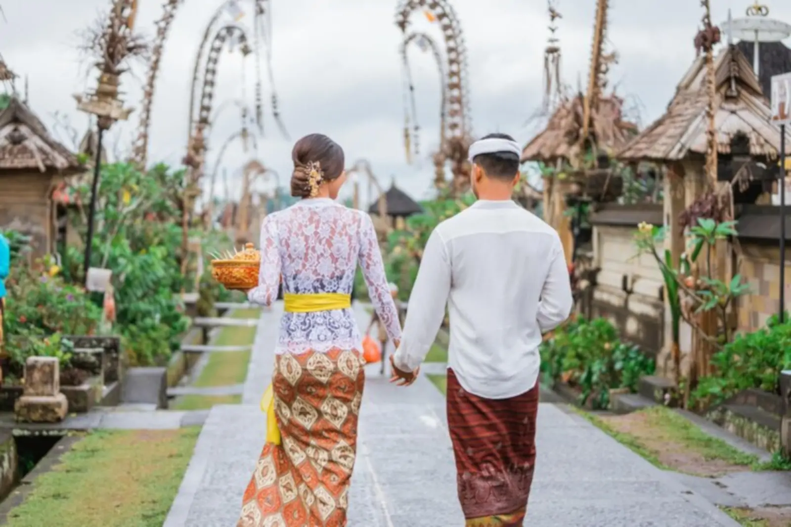 Couple visiting Ubud during Galungan cultural festival in Bali