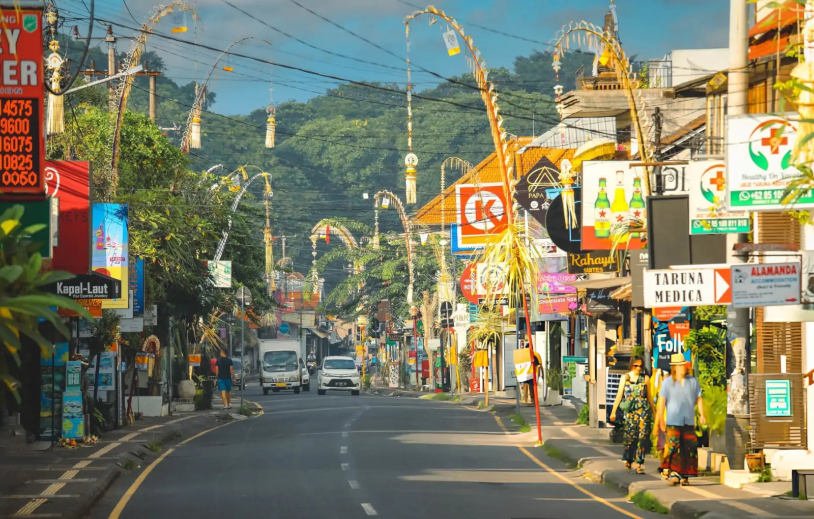 Ubud village decorated with penjor during Galungan in Bali