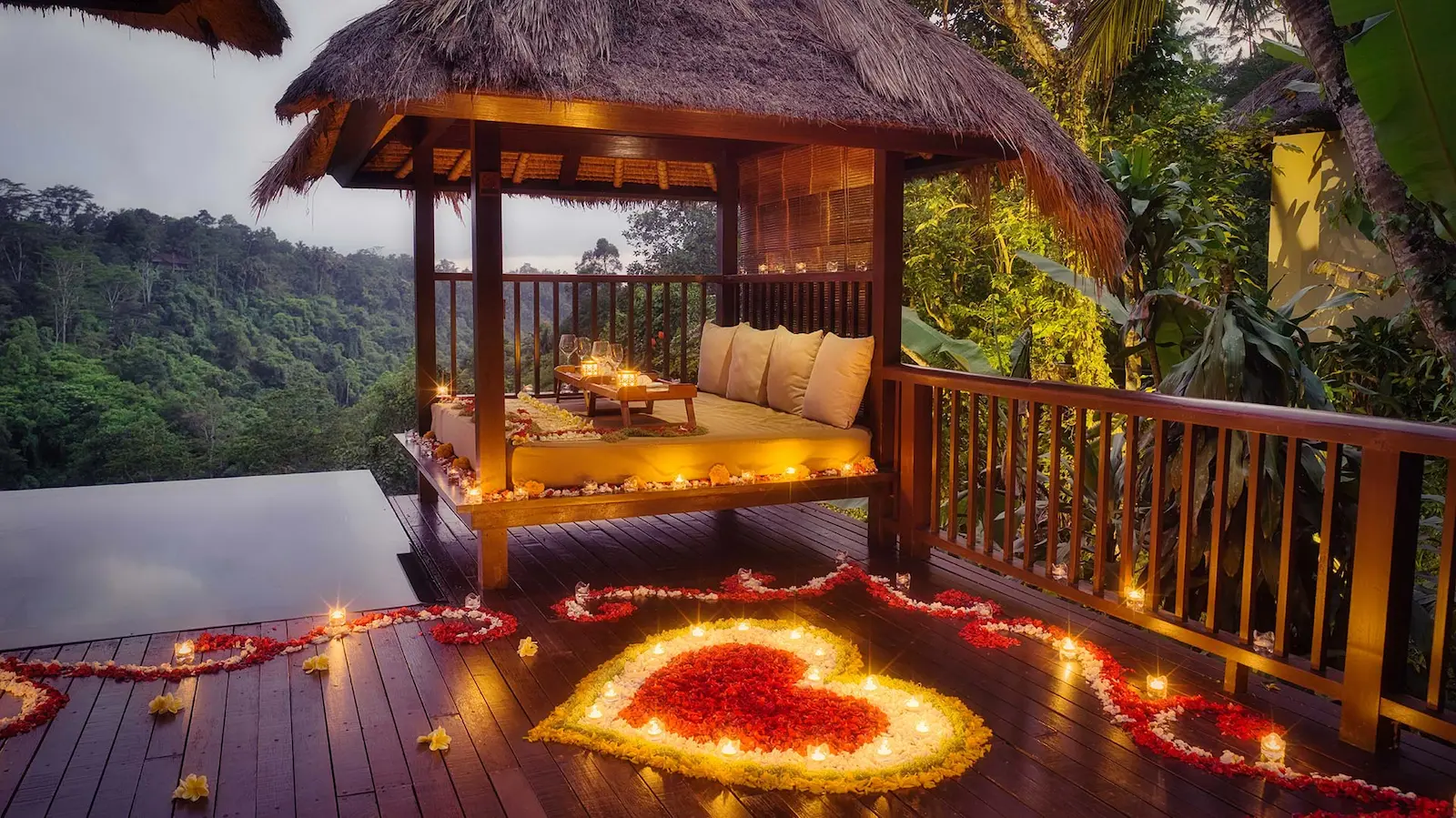 3) Floating Candlelit Dinner Surrounded by Flowers