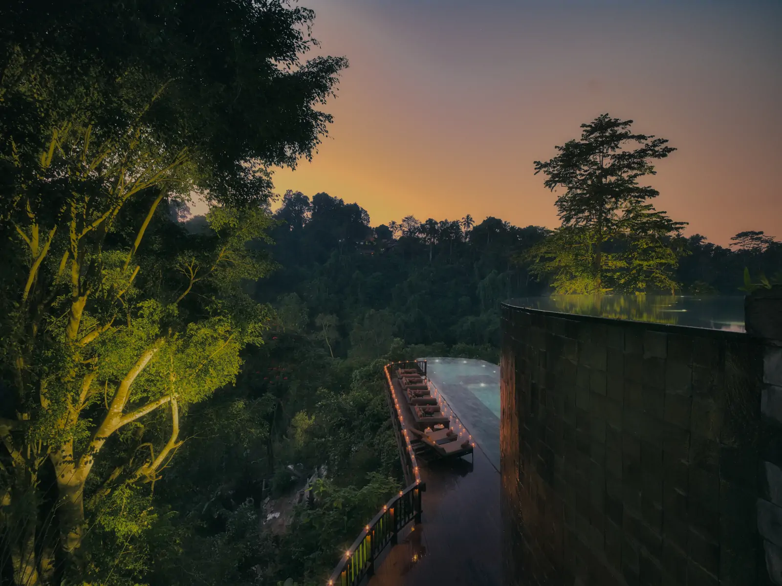 Infinity pool overlooking rainforest valley during March in Bali