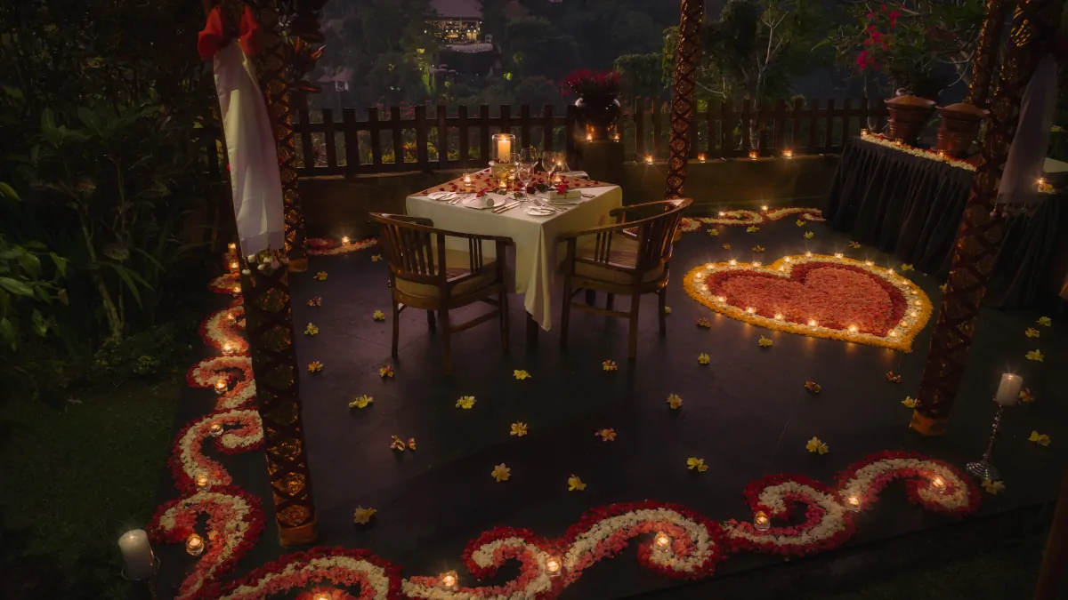 Romantic dinner overlooking jungle valley in Ubud with candlelight and evening atmosphere