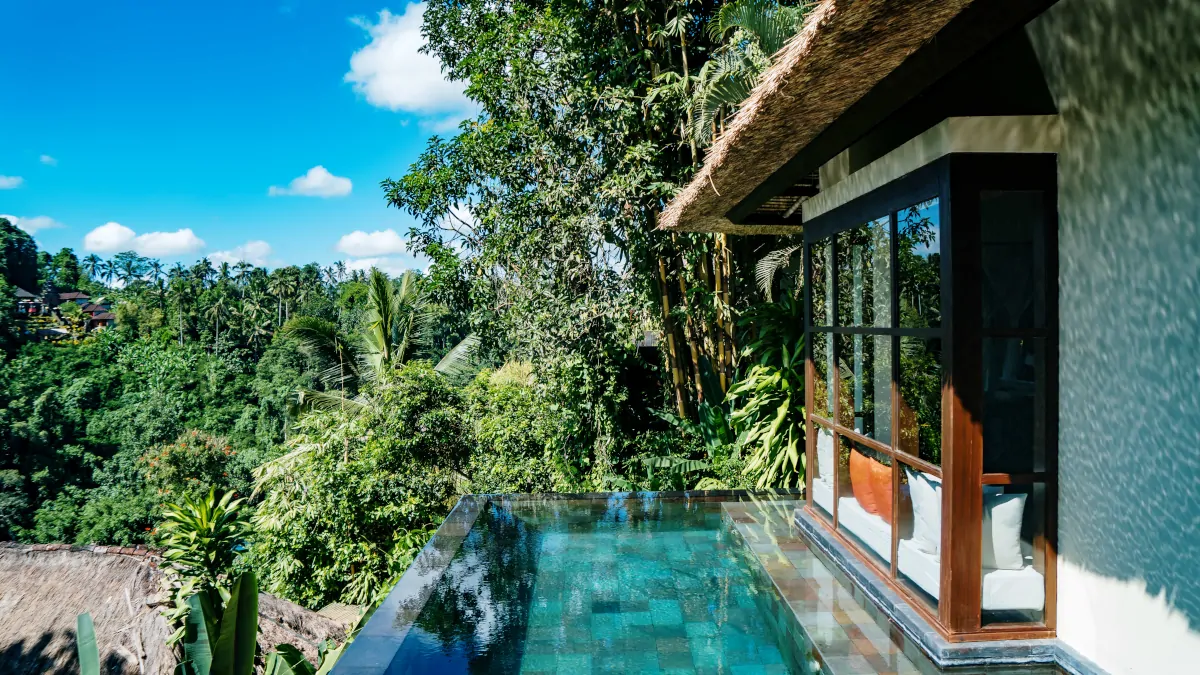 Luxury jungle villa in Ubud integrated into natural landscape with privacy and open views