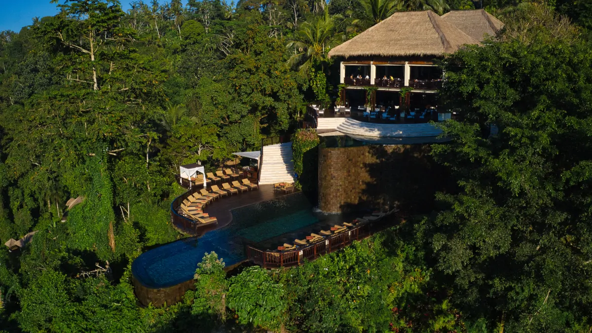 Hanging Gardens of Bali iconic two-tier infinity pool above jungle valley Ubud Bali
