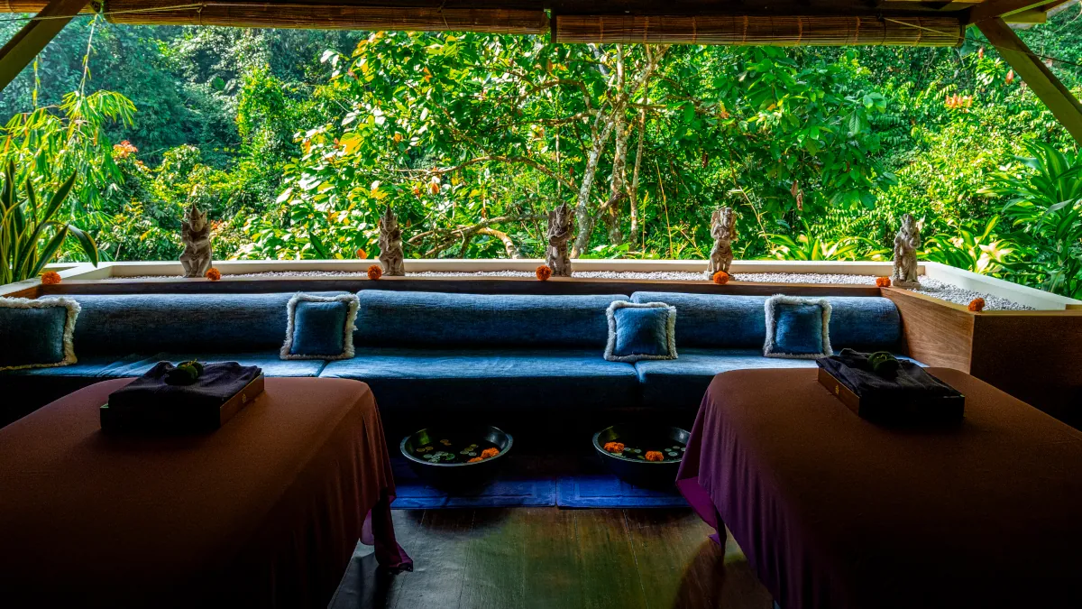 Luxury spa treatment overlooking the rainforest on a rainy day in Bali