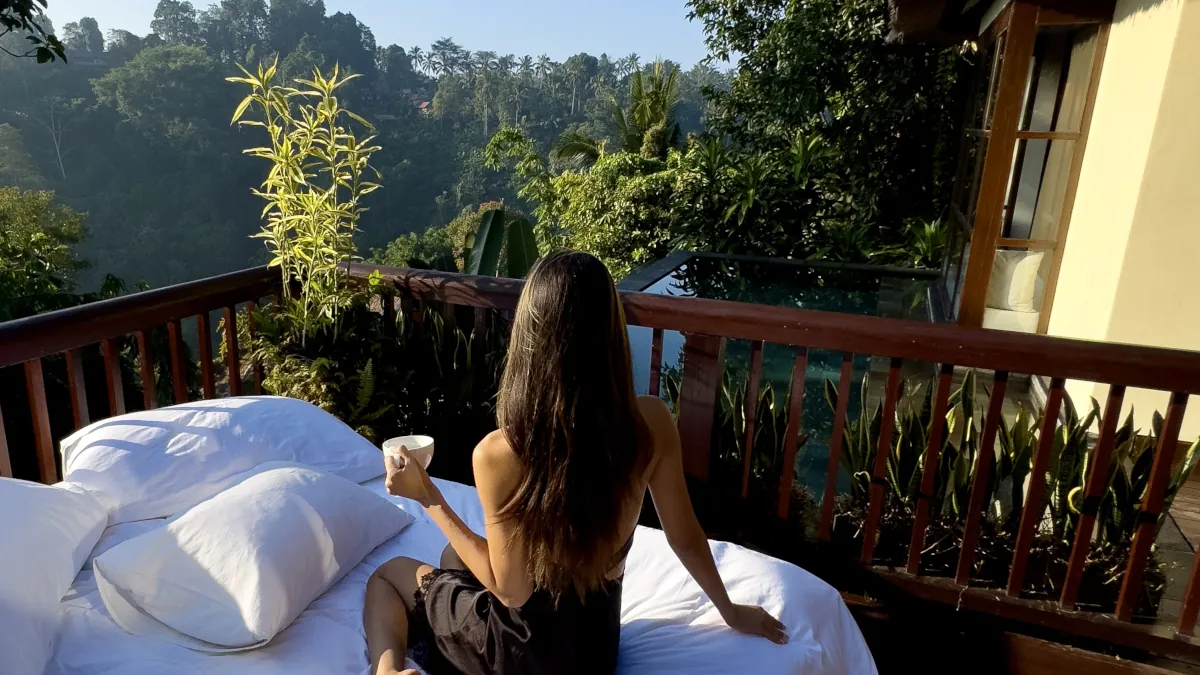 Relaxing beside a private rainforest pool during a luxury stay in Ubud